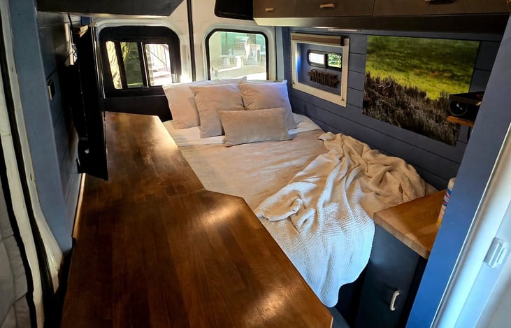 Plenty of counter space for food prep to cook on your campfire/outside grill. (You may also use a jet boil indoors at night to make tea/coffee. Microwave above for "lazy cooking"
