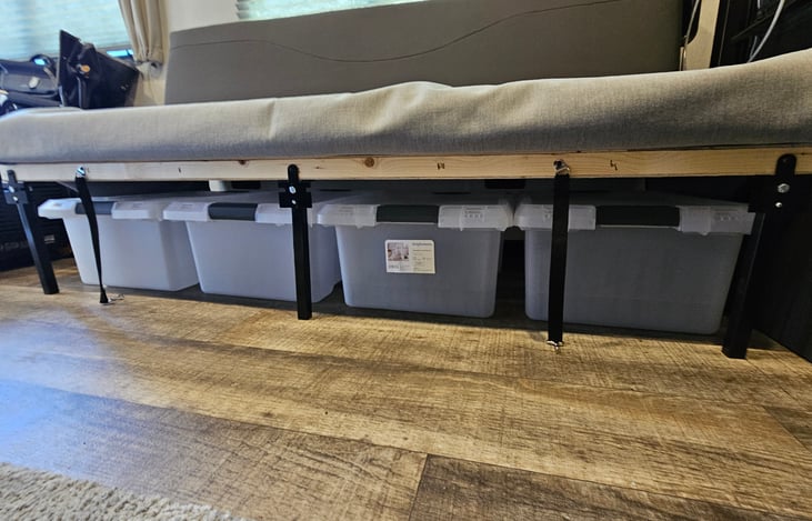 Store bags and bins conveniently under the bench.