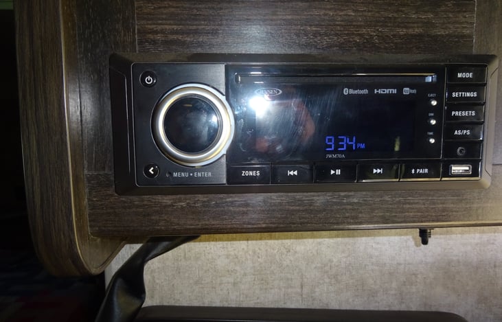 Radio/blu tooth enabled with option for exterior tunes too