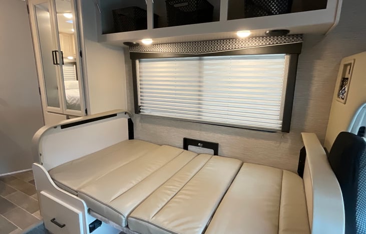 Easy convertible dream dinette sleeps one adult comfortably. Added storage above and drawer below.