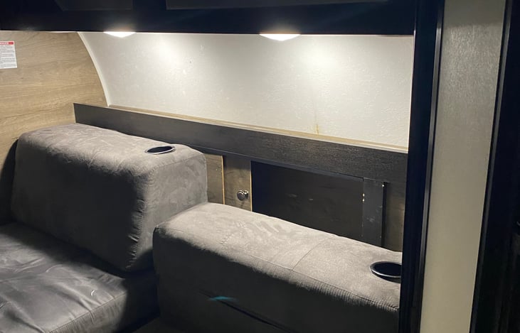 interior front storage and lightling. Includes USB charger for 2 ports