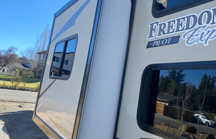 SLIDE OUT.   DOUBLE BUNKS HAVE THEIR OWN WINDOWS.