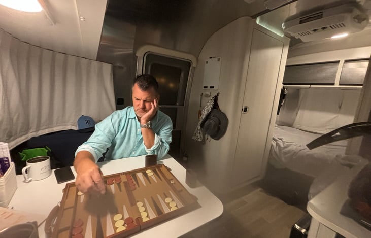 Backgammon is included.  The husband is not.