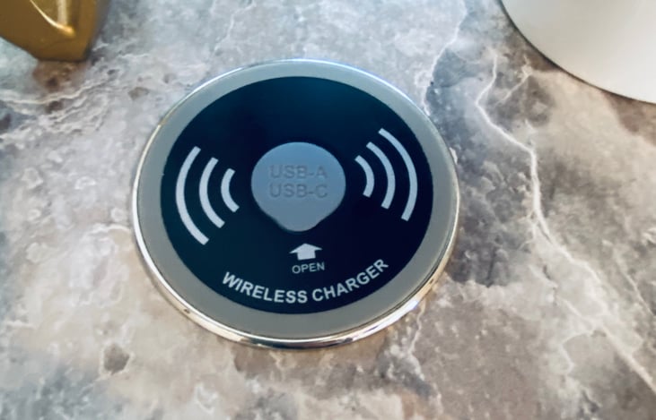 Wireless charging station built into table