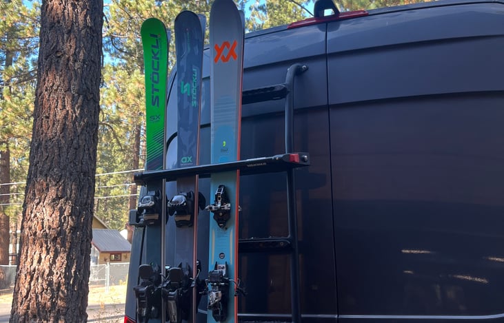 Ladder mount ski rack for 4 pair of skis. Ski package includes boot dryers, helmet/jacket racks, snow shovel, and powder hoe/scraper.