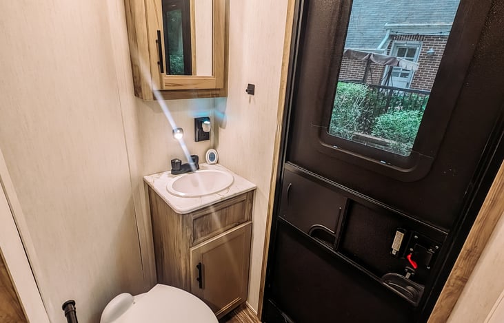 1/2 bath with easy access from outside for guests while entertaining.