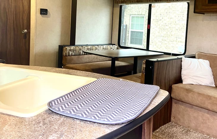 Main Area
Dining Table and Sofa can be converted to bed.