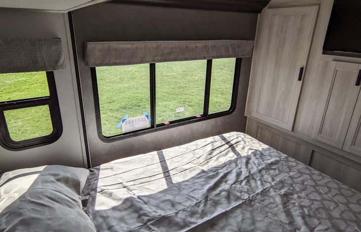 TV and drawer space in bedroom