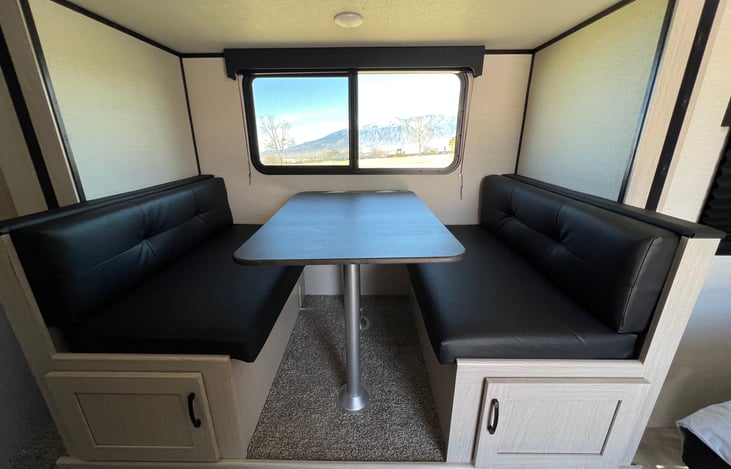 Storage for your games or extra blankets. We have supplied UNO, 2 decks of playing cards, outdoor Checkers and Pictionary.