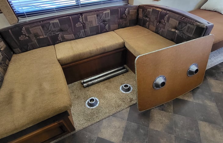 ***STEP 1 of 3***: Turn your dining table into a sleeper bed in no time. Simply pull the table top straight up and off of the Two poles that it rests on, and also remove the two poles. 
***SEE STEP 2*