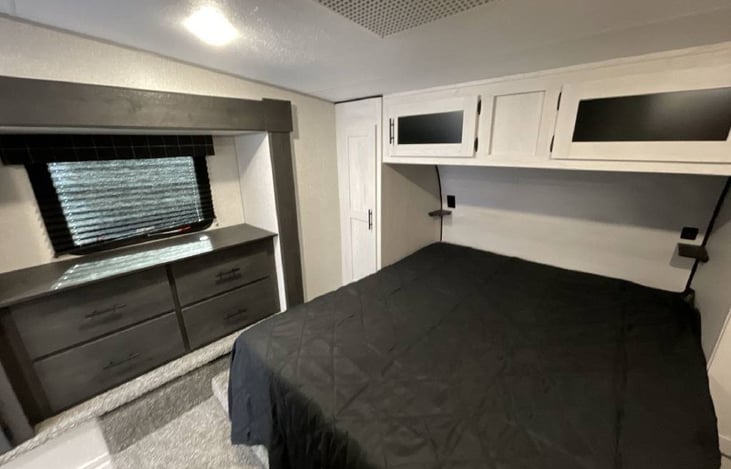 View of master bedroom with a Serta queen.