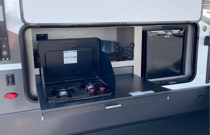 Outside kitchen, refrigerator, and storage