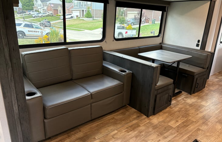 trifold sofa and convertible U shaped dinette