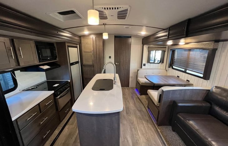Open-concept layout with dual slide-outs and residential touches. You’ll feel like you brought the house with you — just on wheels!