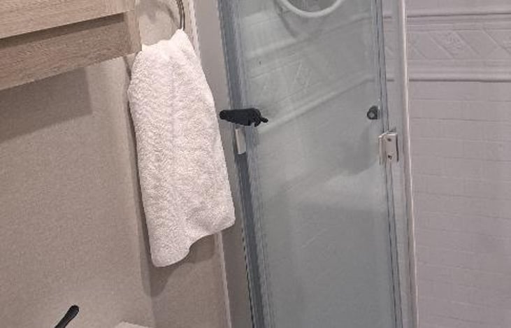 Bath Cabinet/mirror/ electrical outlet available.