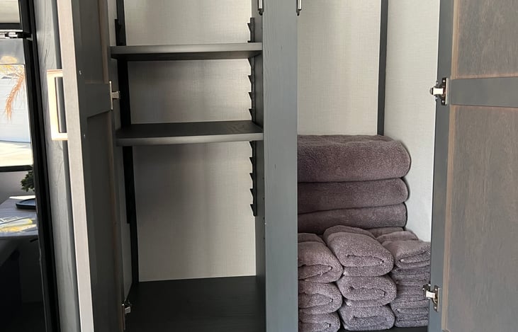 Pantry, closet and small storage space. Closet includes set of 6 towels, hand towels and wash cloths.