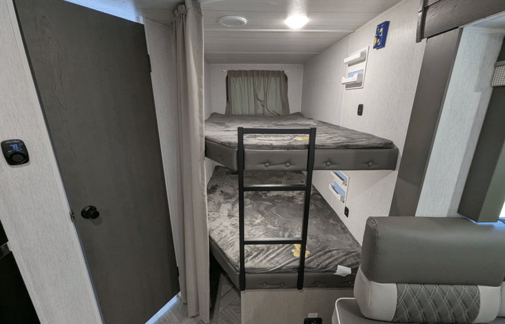 Large Twin-XL bunks with USB charging ports.