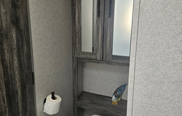 toilet and storage area