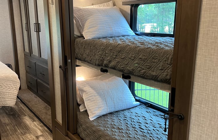 Bunks, right outside master with closing doors