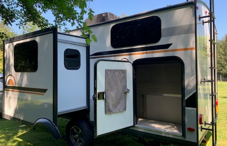 Storage area with bottom bunk folded up
