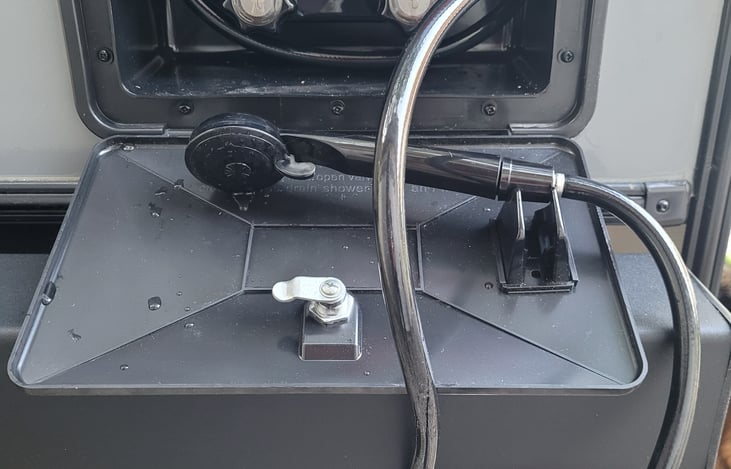 Outdoor shower runs both hot and cold water.  Perfect for a rinse off after a beach day, doing dishes, or washing down the dog.