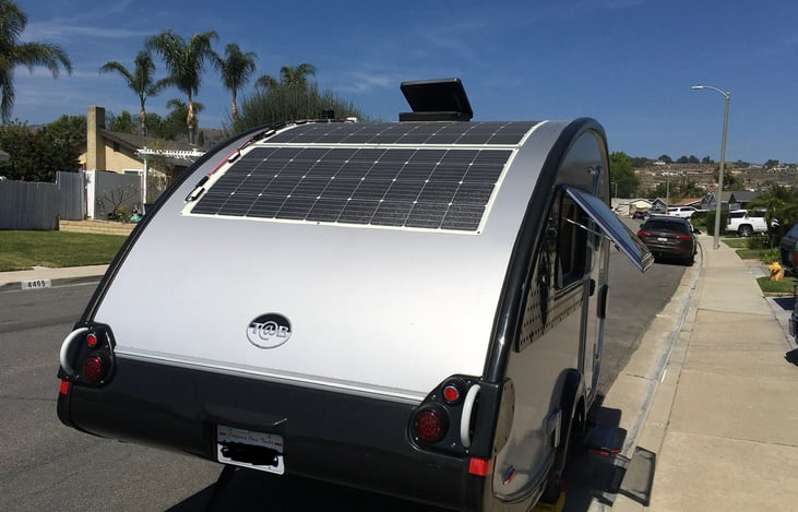 Pass through side windows and solar panels