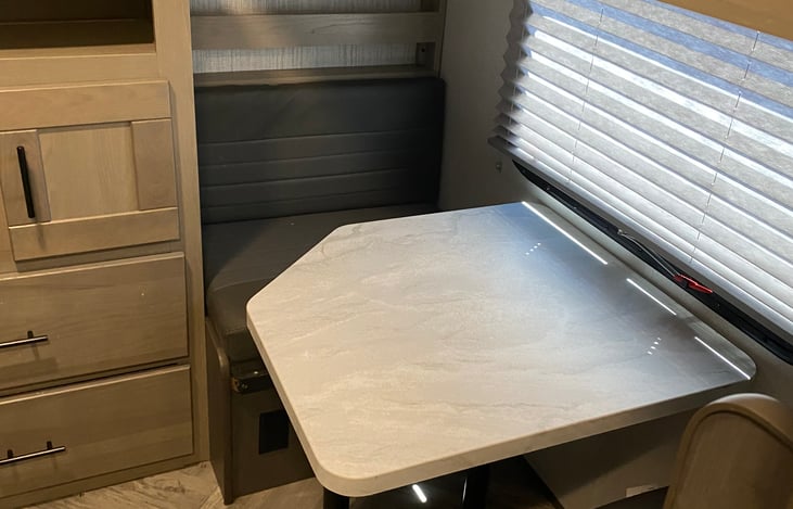 bunkhouse table coverts to narrow bed and another bunk above, bunkhouse sleeps 4.