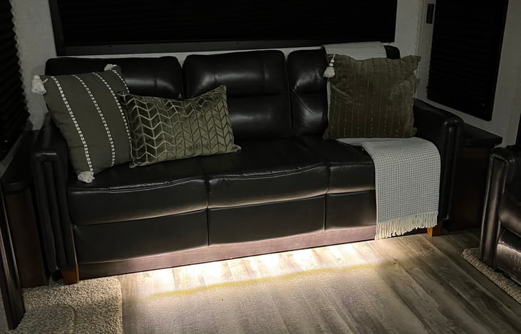 Lights under couch and chairs for a “theater” experience!