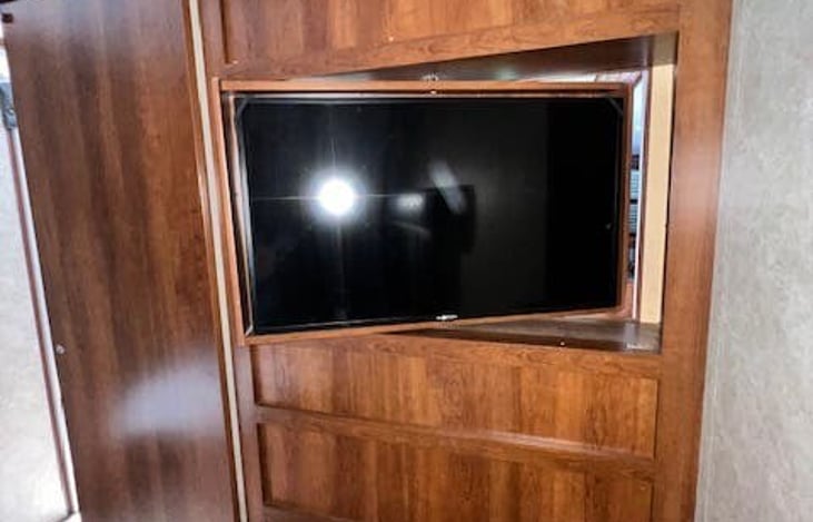 Bedroom: flip around TV/mirror combo.