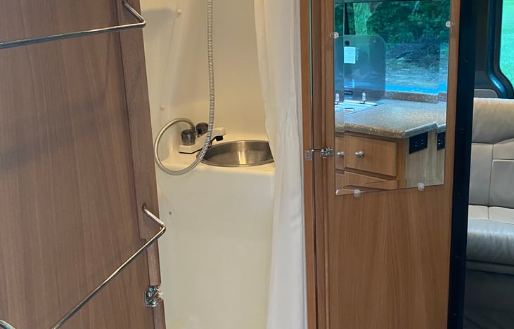 Bathroom mirror and towel racks