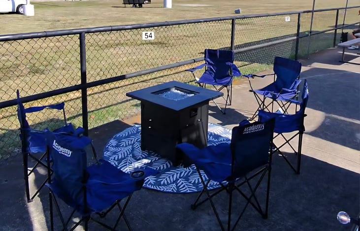 The Hot Tub Suite comes with a outside rug, fire pit and 6 chair sitting area