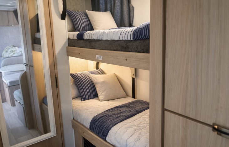 2 single bunks, camper sleeps 5