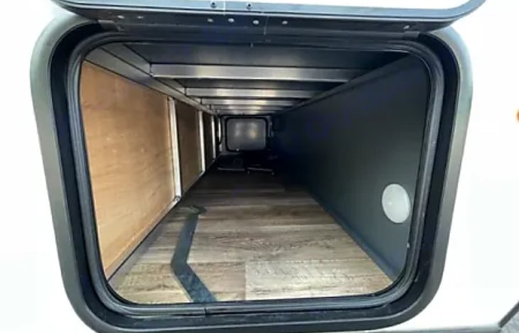 This outdoor storage area provides the ultimate convenience for all your outdoor needs.