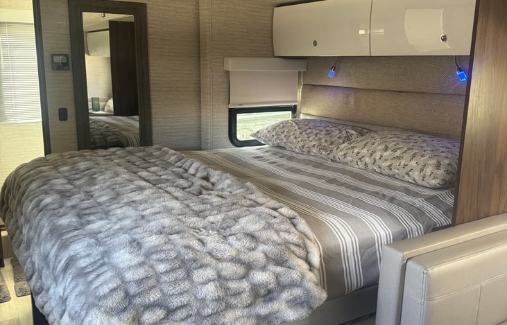 Comfy RV queen bed.