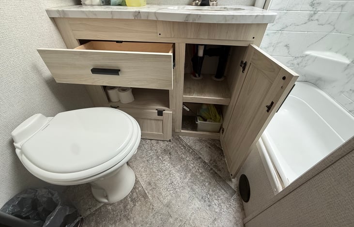 RV Toilet and base cabinet of sink