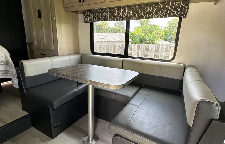 Dining table easily turns into a full bed.