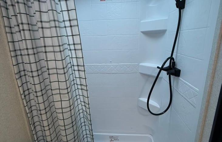 Separate Shower with a Tankless Hot Water Heater for your comfort.