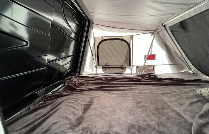Large tent can sleep up to three