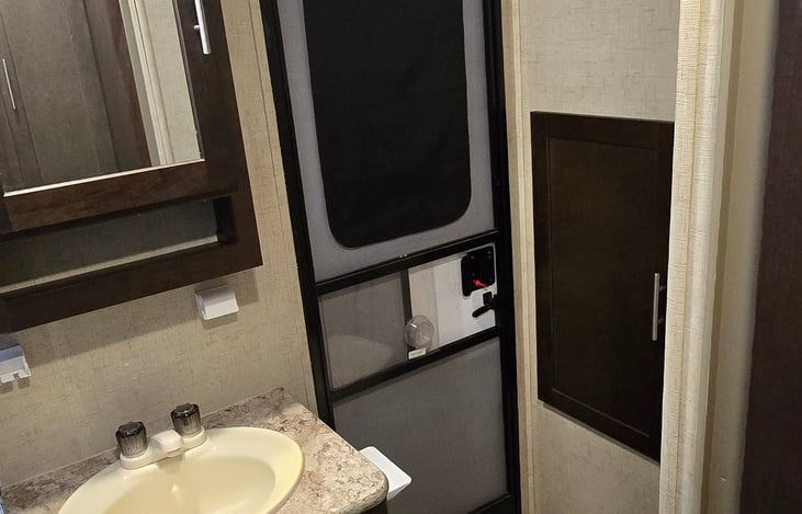 bathroom with 2nd door, great option so you don't have to walk through the kitchen area.