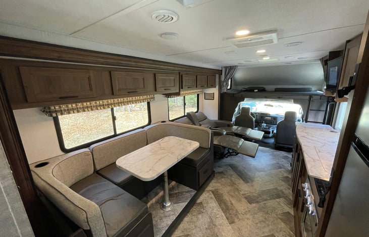 huge overhead bunk with privacy curtain.