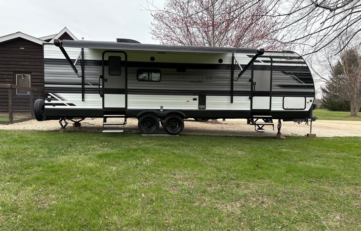Large awnings to get out of the sun and blue tooth speakers to enjoy your favorite music while relaxing outside or entertaining by the fire.