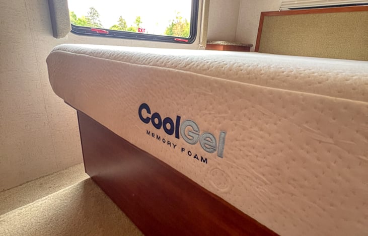 Glamping, Lux camping, rolling hotel on wheels. Whatever you call it,  you won't sacrifice  comfort. This BRAND NEW mattress will have a mattress protector and crisp sheets calling you to sweet sleep!