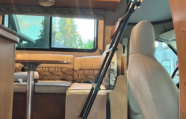 view into Minnie from the door. The ladder is up for access to the bed over the cab.