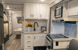 C06 - 10 Person w/ Bunk- The RV Rental Factory