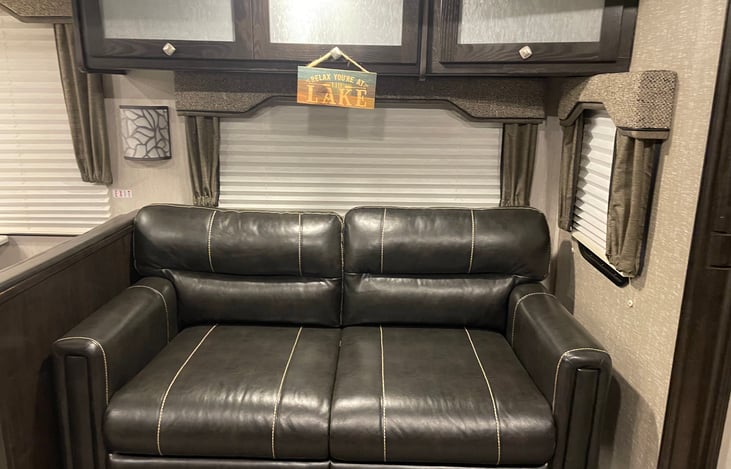 Couch folds out to a Full size bed.