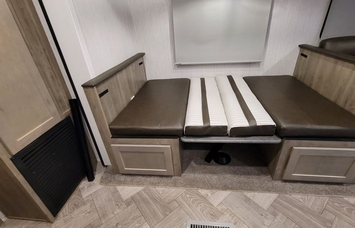 Kitchen table converts to a bed