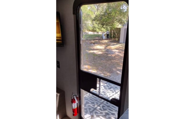keep the bugs out and the kids inside with a screen door at the side door (only door to outside)