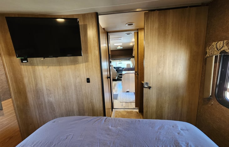 TV in the Master Suite&  Pocket door for privacy.