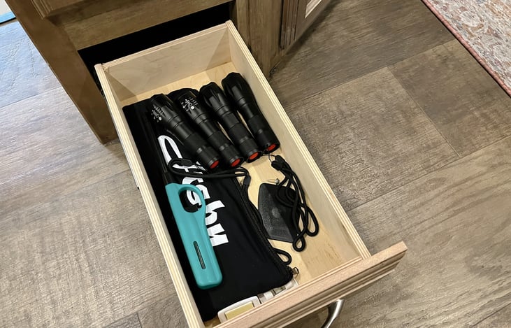 Flashlights, skewers, lighters, bug spray, sunscreen and more included for use.