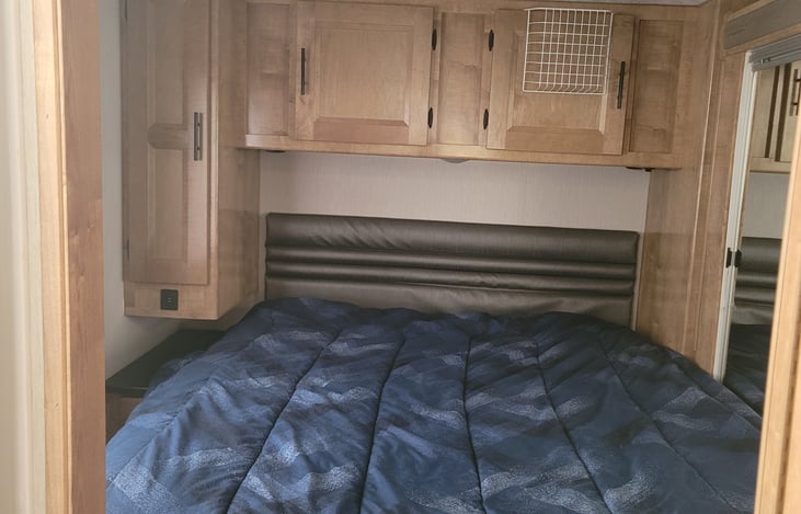 Three closets, two overhead storage cupboards.  Full length mirror on large closet.